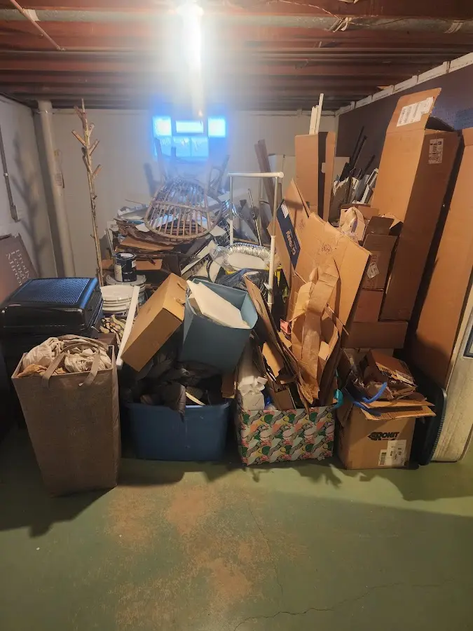 Roll-off dumpster container at job site for Yard Waste Dumpster Rental in Ghent